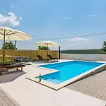 With Heated Pool